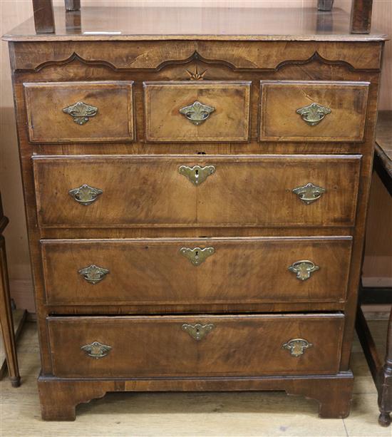A mid 18th century North Country inlaid mahogany chest, of three short and three long drawers, W.82cm